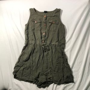 Dark green romper size XL 14/16 with a button up front and two pockets